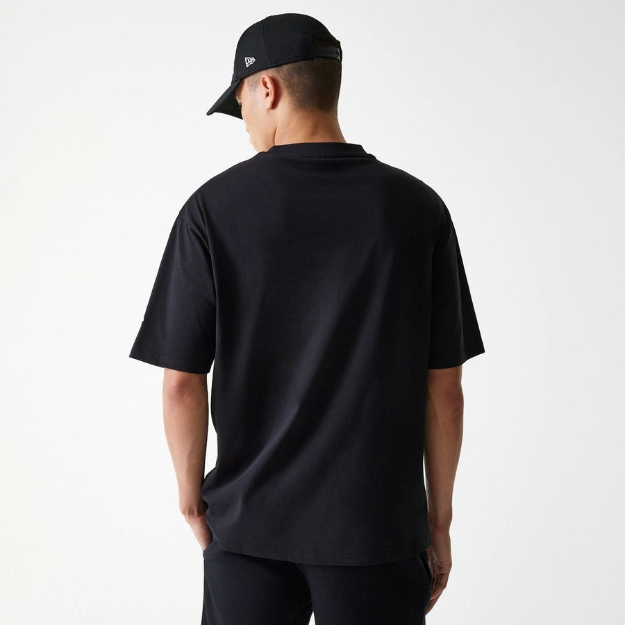 The Male model is wearing New York Yankees MLB League Essential Black Oversized T-Shirt 2