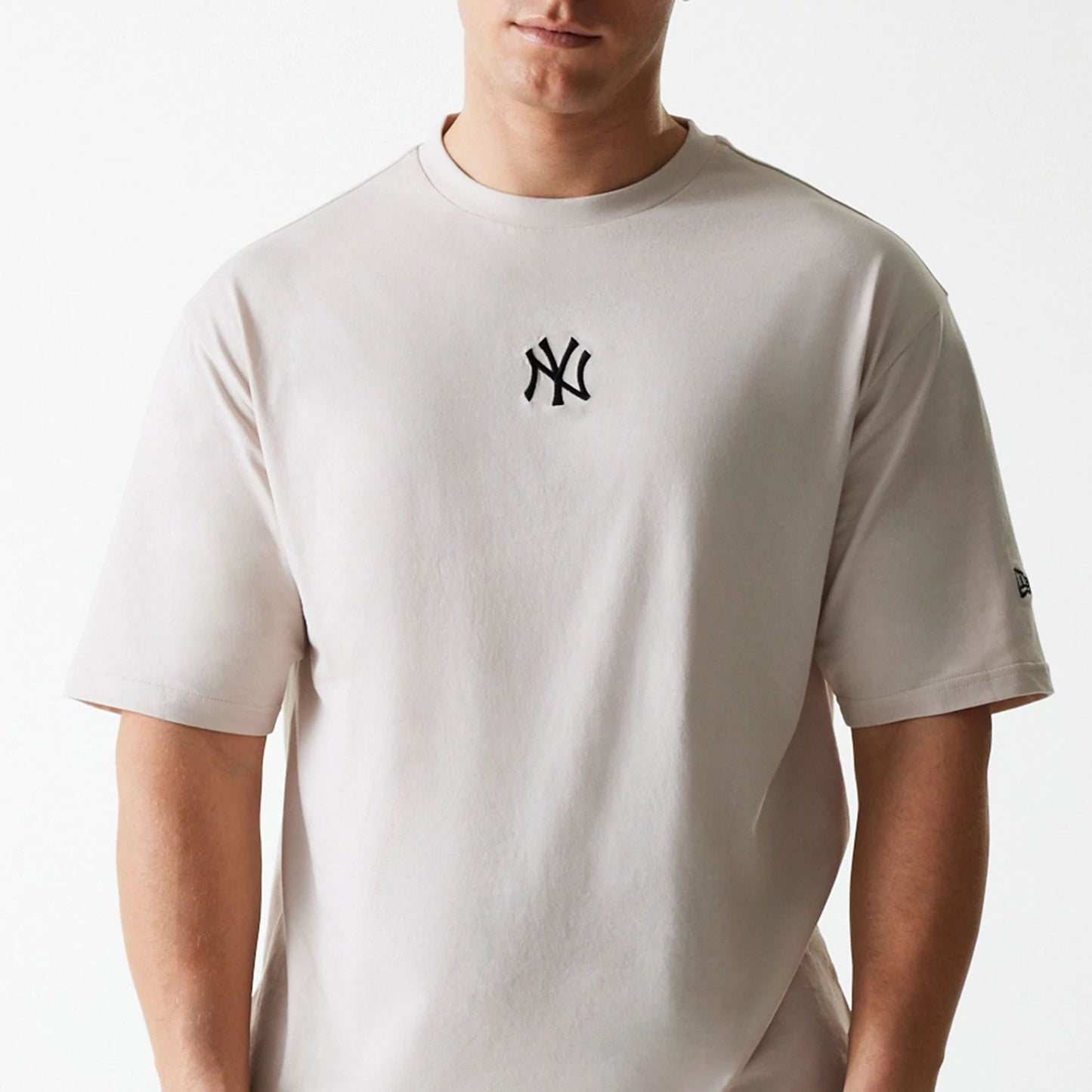 The Male model is wearing New York Yankees MLB League Essential Cream Oversized T-Shirt 3