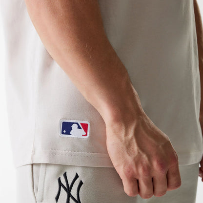 The Male model is wearing New York Yankees MLB League Essential Cream Oversized T-Shirt 6