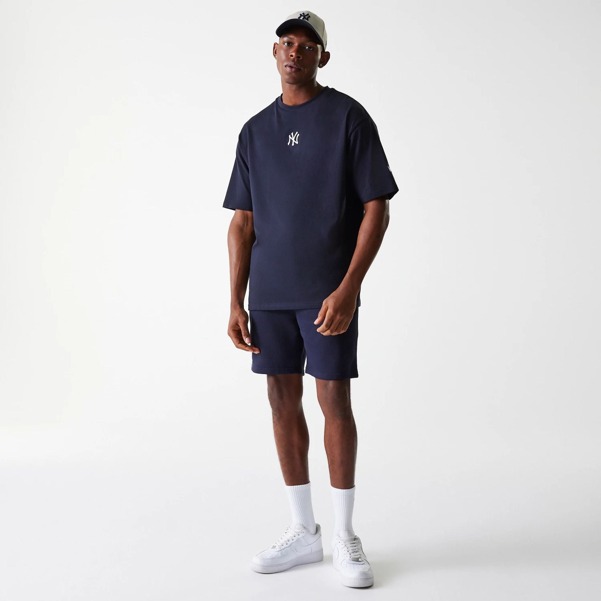 The Male model is wearing New York Yankees MLB League Essential Navy Oversized T-Shirt 7