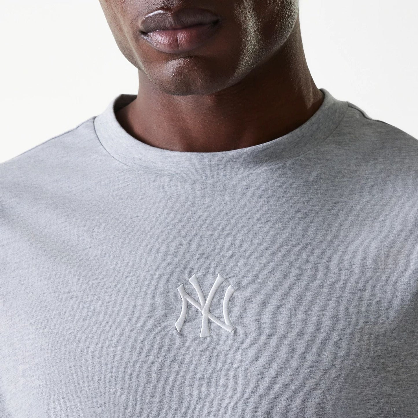 The Male model is wearing New York Yankees MLB League Essential Grey Oversized T-Shirt 4