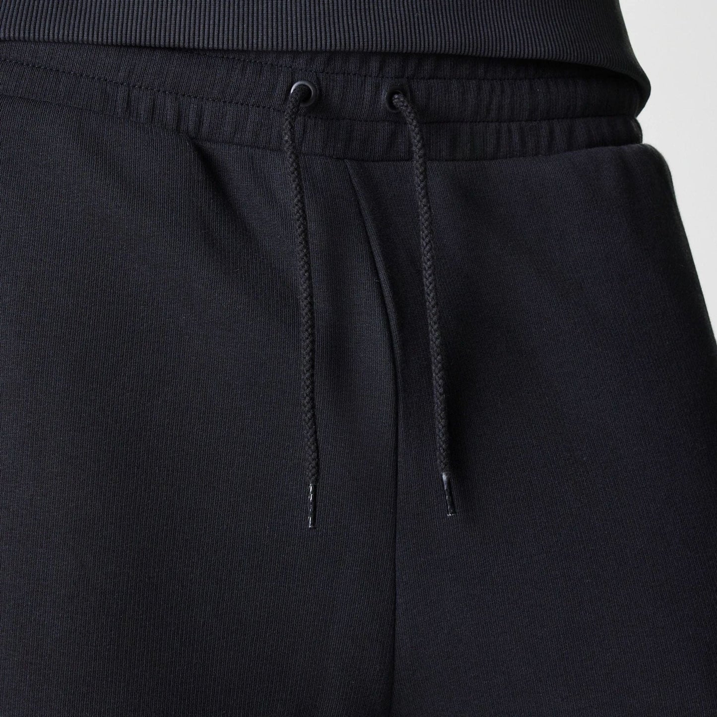 The Male model is wearing New York Yankees MLB League Essential Midi Black Joggers 6