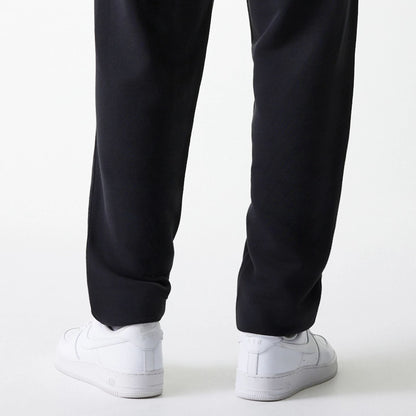 The Male model is wearing New York Yankees MLB League Essential Midi Black Joggers 7