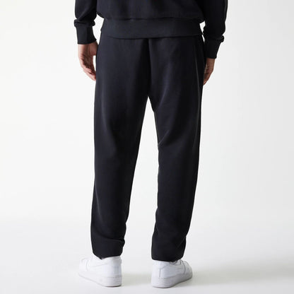 The Male model is wearing New York Yankees MLB League Essential Midi Black Joggers 2