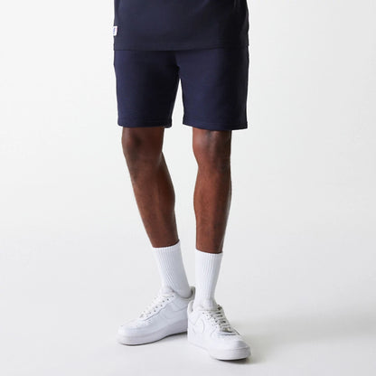 The Male model is wearing New York Yankees MLB League Essential Navy Shorts 3