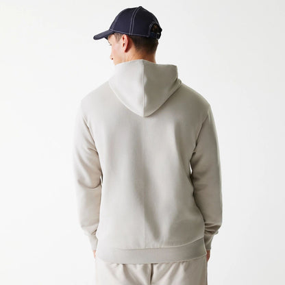 The Male model is wearing New York Yankees MLB League Essential Midi Cream Oversized Pullover Hoodie 2