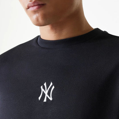The Male model is wearing New York Yankees MLB League Essential Black Crew Neck Sweater 4