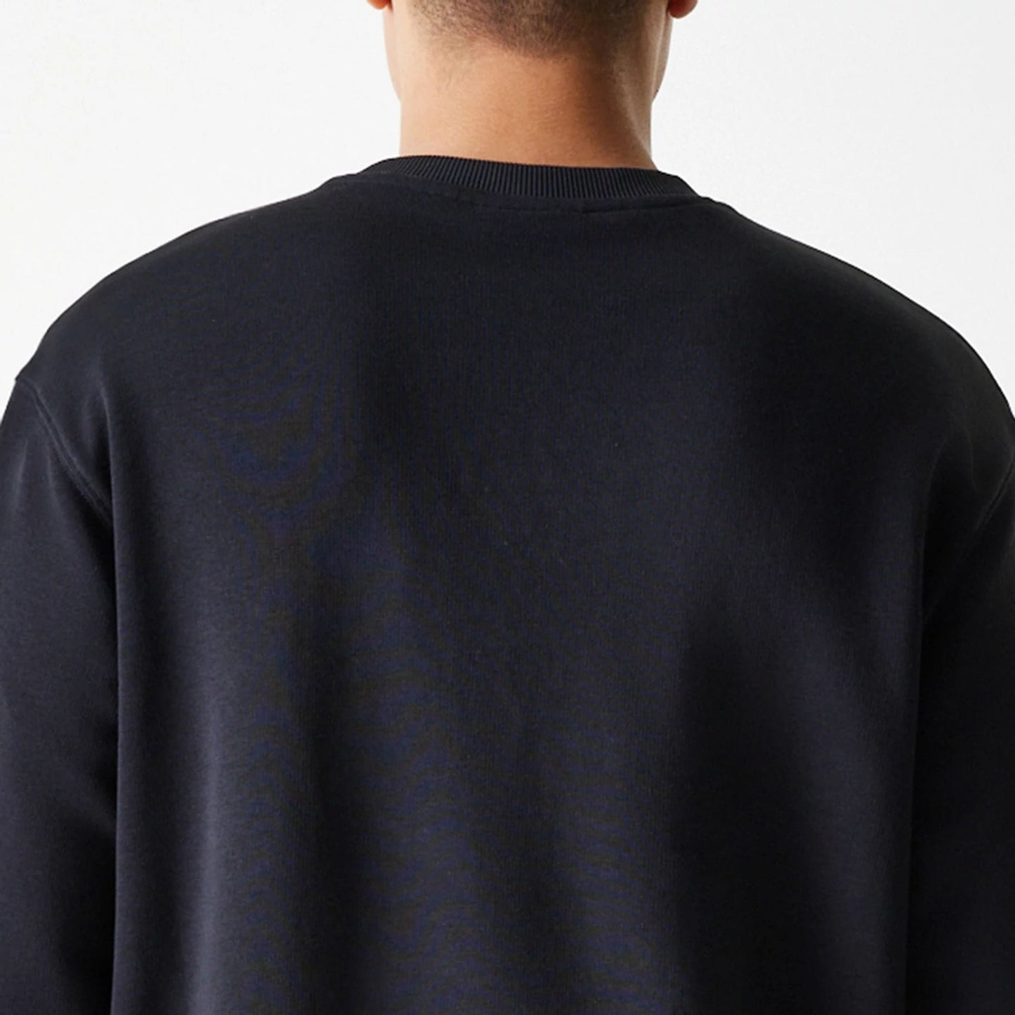 The Male model is wearing New York Yankees MLB League Essential Black Crew Neck Sweater 7
