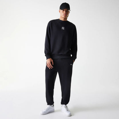 The Male model is wearing New York Yankees MLB League Essential Black Crew Neck Sweater 8