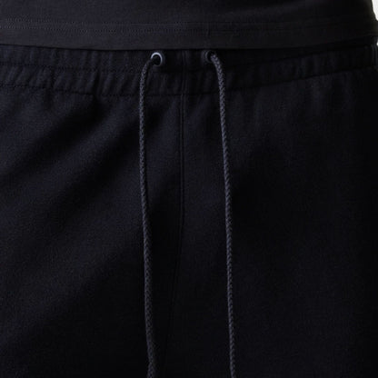 The Male model is wearing New York Yankees MLB League Essential Black Shorts 6