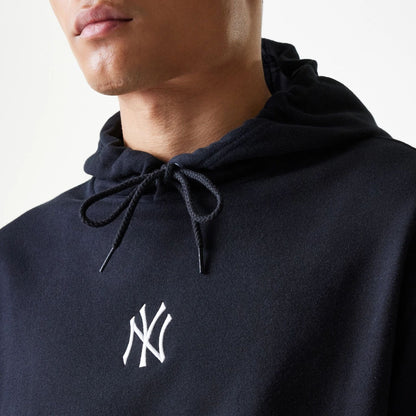 The Male model is wearing New York Yankees MLB League Essential Midi Black Oversized Pullover Hoodie 4