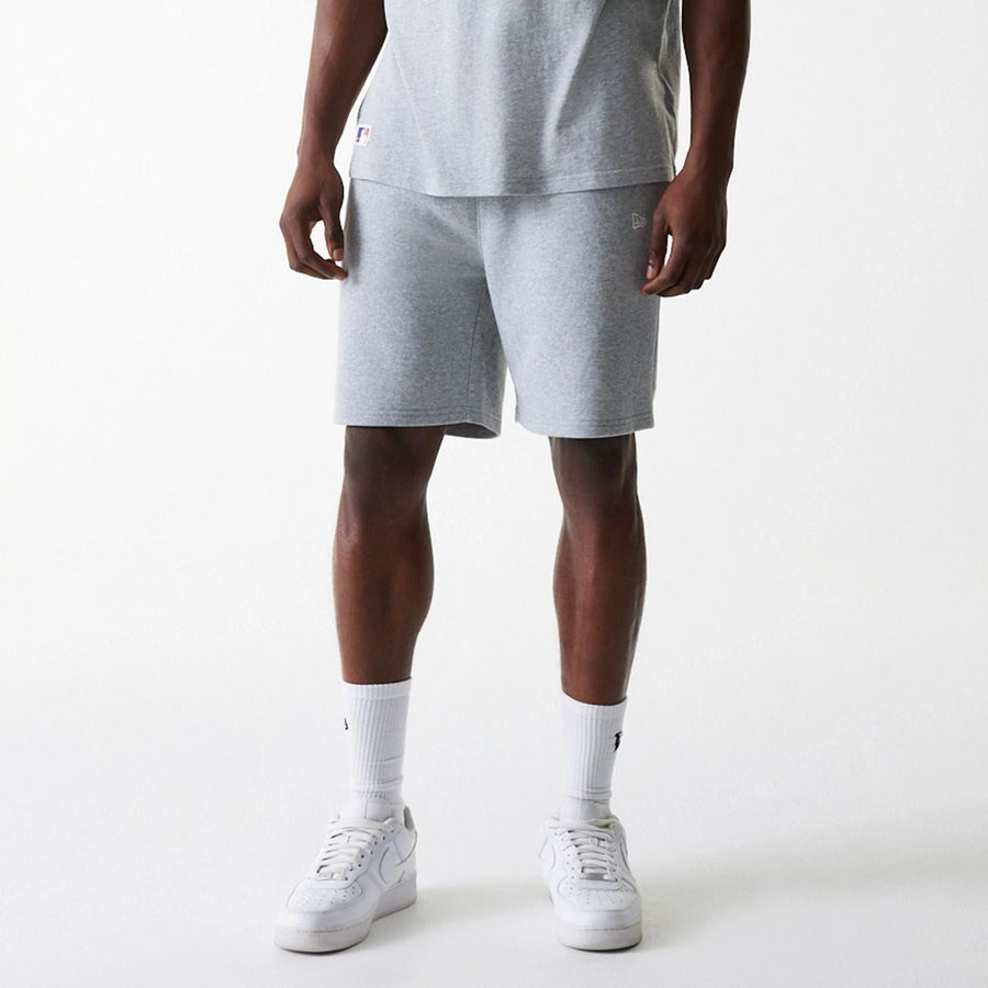 The Male model is wearing New York Yankees MLB League Essential Grey Shorts 3
