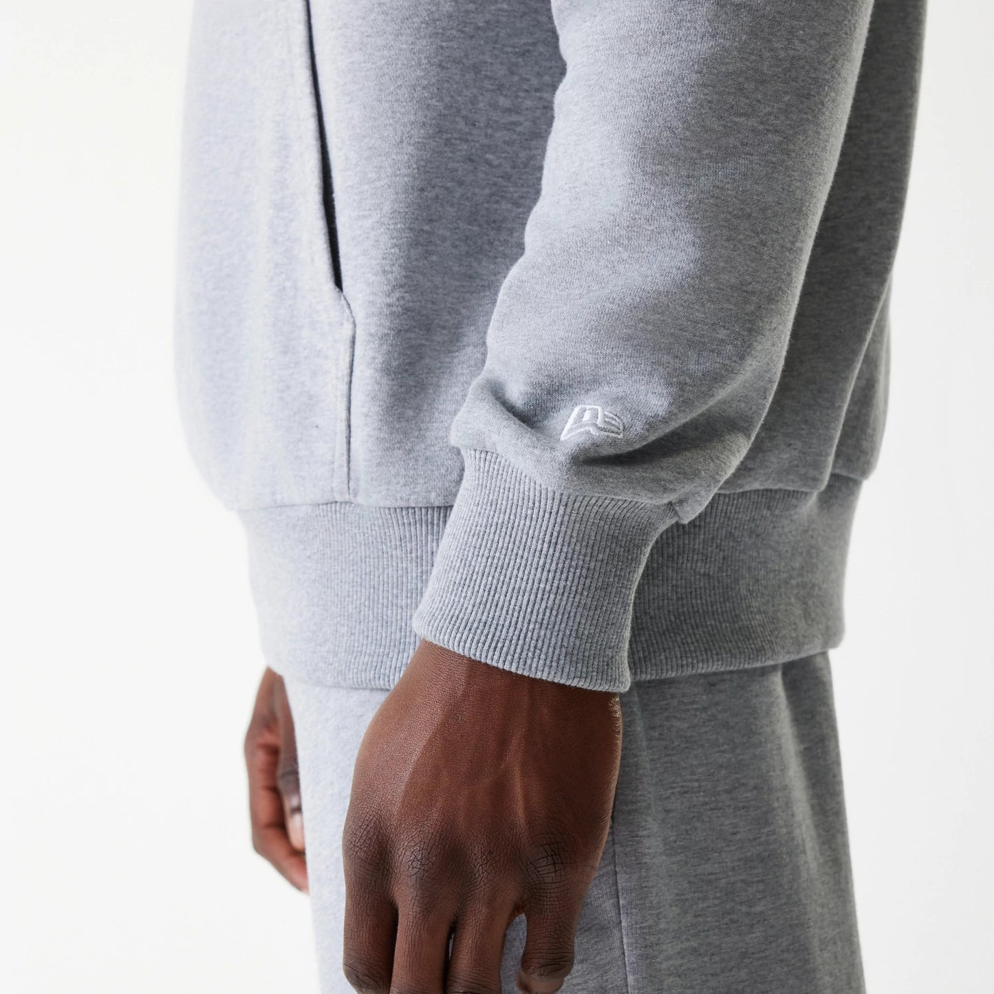 The Male model is wearing New York Yankees MLB League Essential Midi Grey Oversized Pullover Hoodie 5