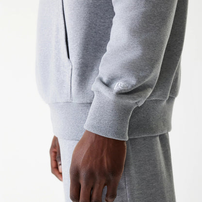 The Male model is wearing New York Yankees MLB League Essential Midi Grey Oversized Pullover Hoodie 5