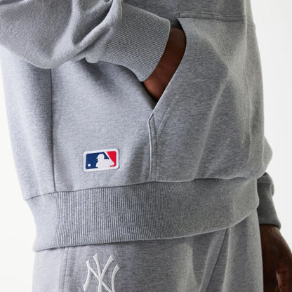The Male model is wearing New York Yankees MLB League Essential Midi Grey Oversized Pullover Hoodie 6