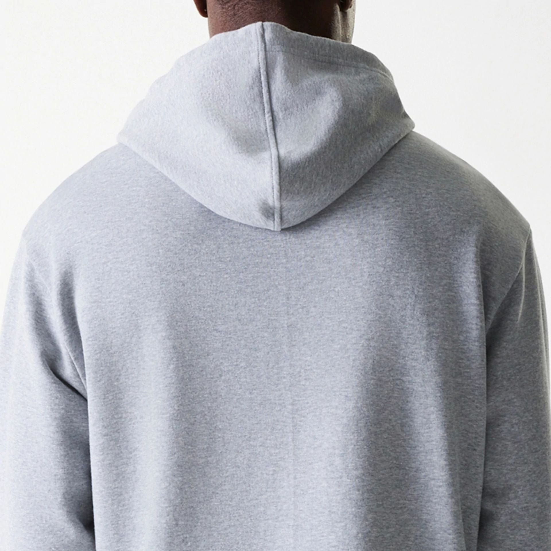 The Male model is wearing New York Yankees MLB League Essential Midi Grey Oversized Pullover Hoodie 7