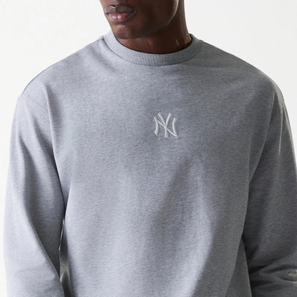 The Male model is wearing New York Yankees MLB League Essential Grey Crew Neck Sweater. 6