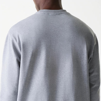 The Male model is wearing New York Yankees MLB League Essential Grey Crew Neck Sweater. 7