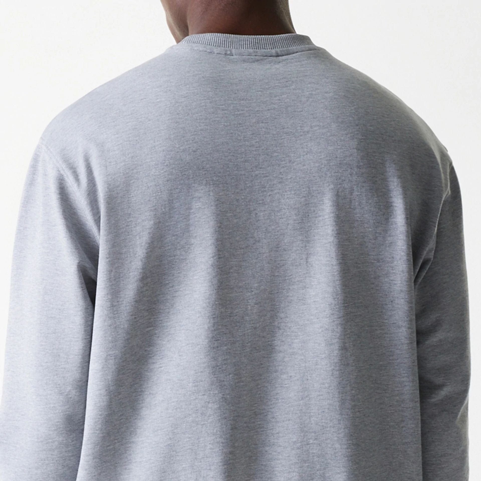 The Male model is wearing New York Yankees MLB League Essential Grey Crew Neck Sweater 7