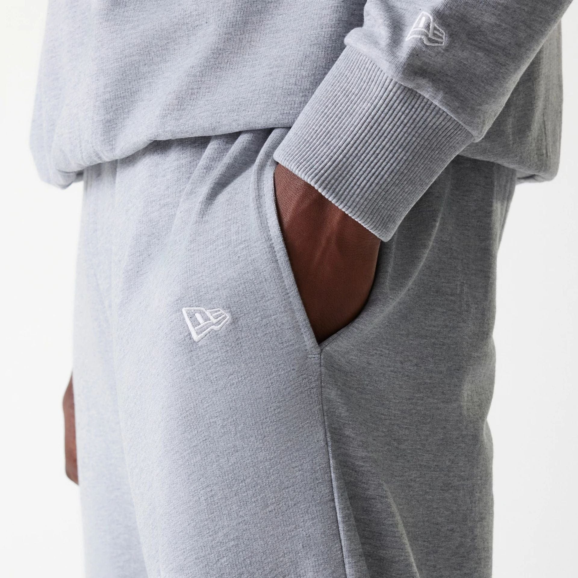 The Male model is wearing New York Yankees MLB League Essential Midi Grey Joggers 5