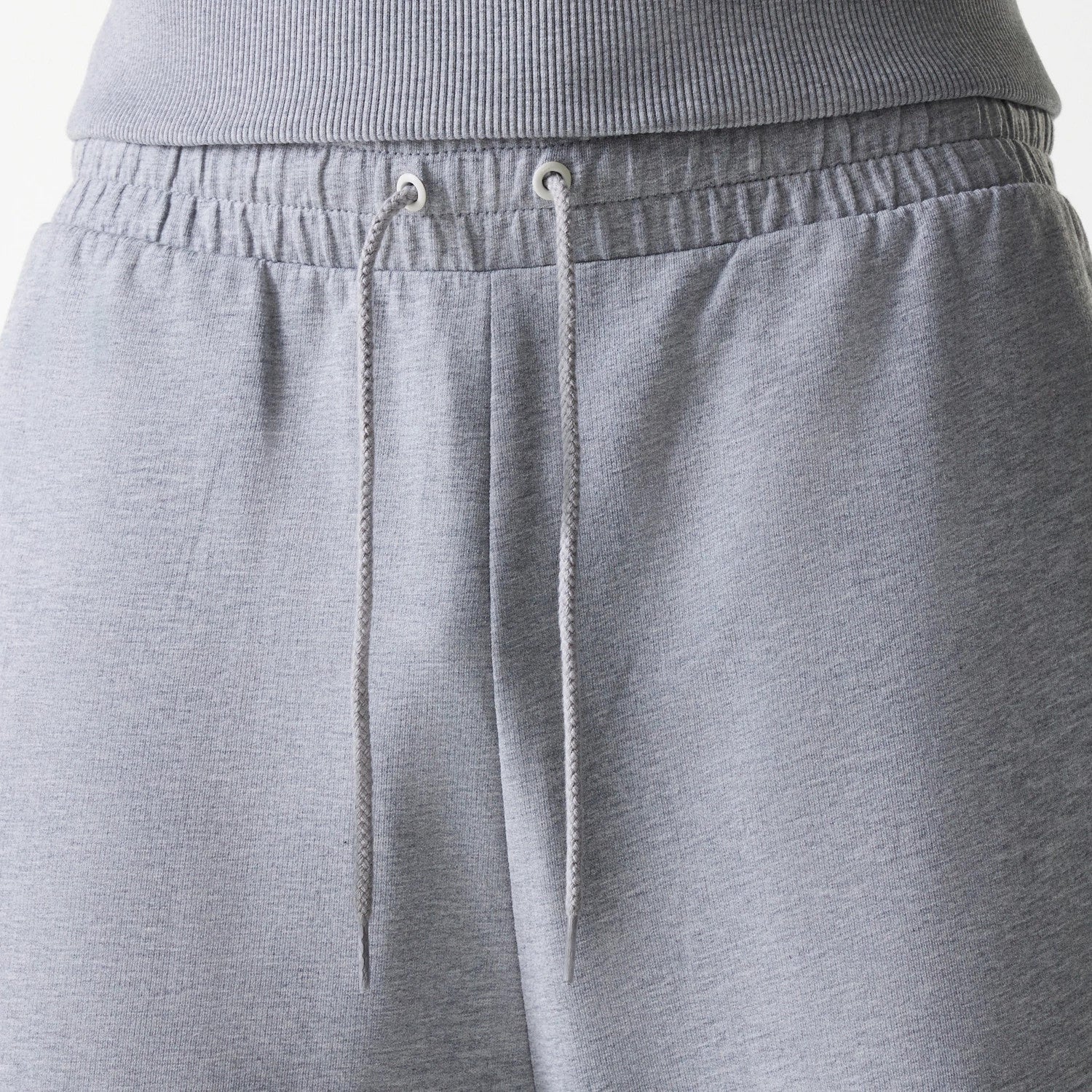 The Male model is wearing New York Yankees MLB League Essential Midi Grey Joggers 6