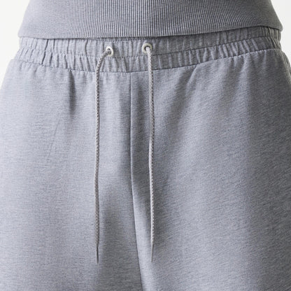 The Male model is wearing New York Yankees MLB League Essential Midi Grey Joggers 6