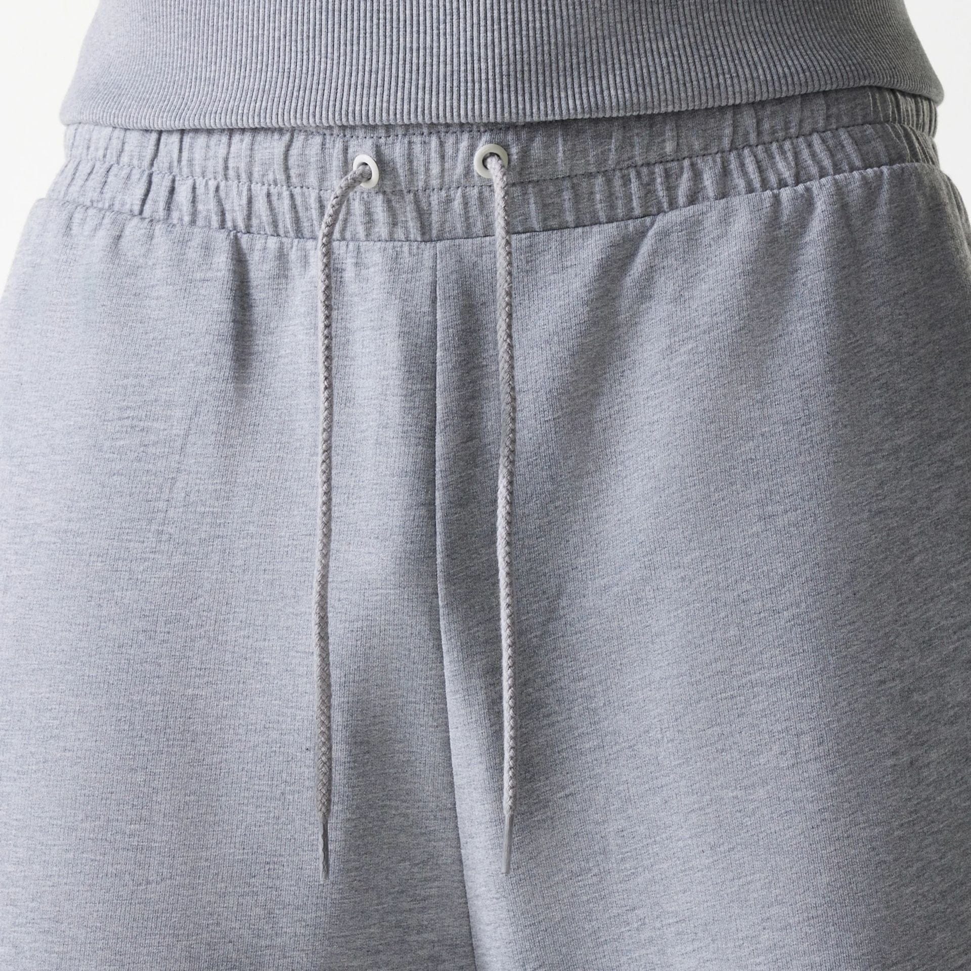 The Male model is wearing New York Yankees MLB League Essential Midi Grey Joggers 6