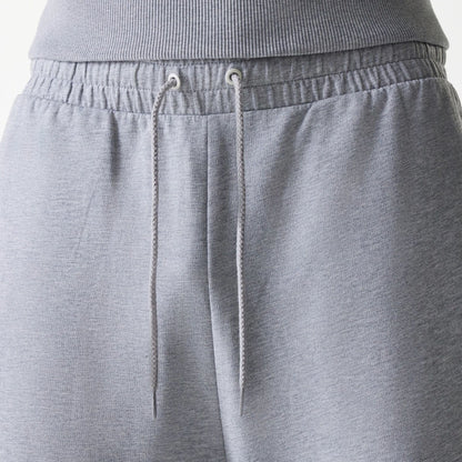 The Male model is wearing New York Yankees MLB League Essential Midi Grey Joggers 6