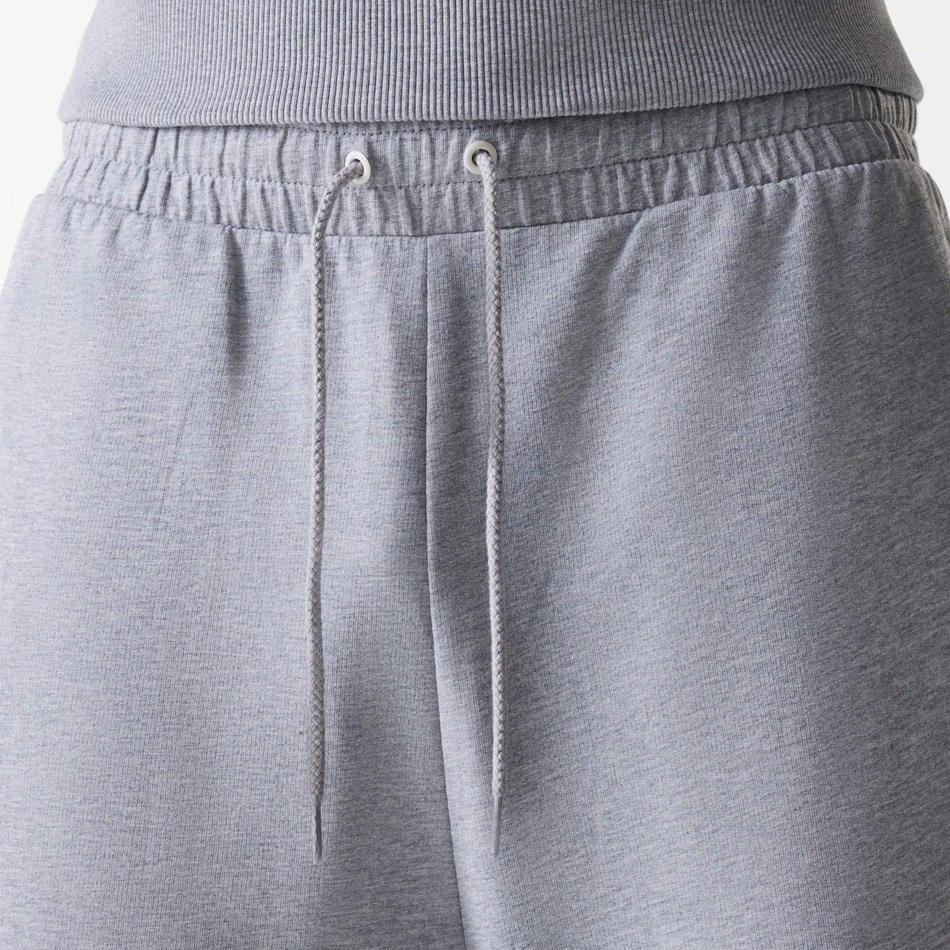 The Male model is wearing New York Yankees MLB League Essential Midi Grey Joggers 6