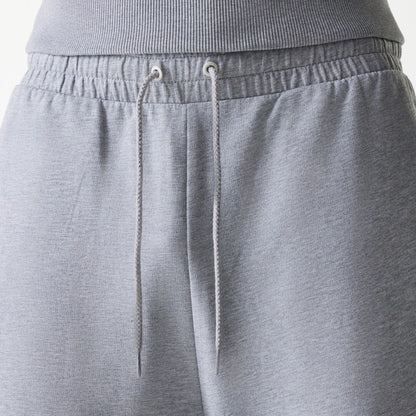 The Male model is wearing New York Yankees MLB League Essential Midi Grey Joggers 6