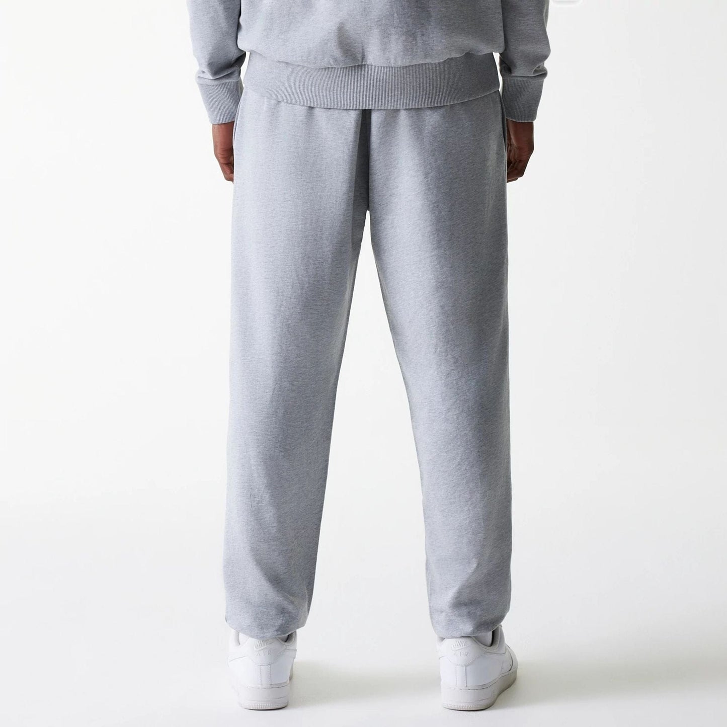 The Male model is wearing New York Yankees MLB League Essential Midi Grey Joggers 2