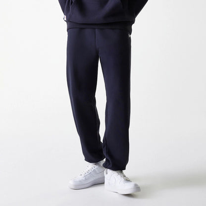 The Male model is wearing New York Yankees MLB League Essential Midi Navy Joggers 3