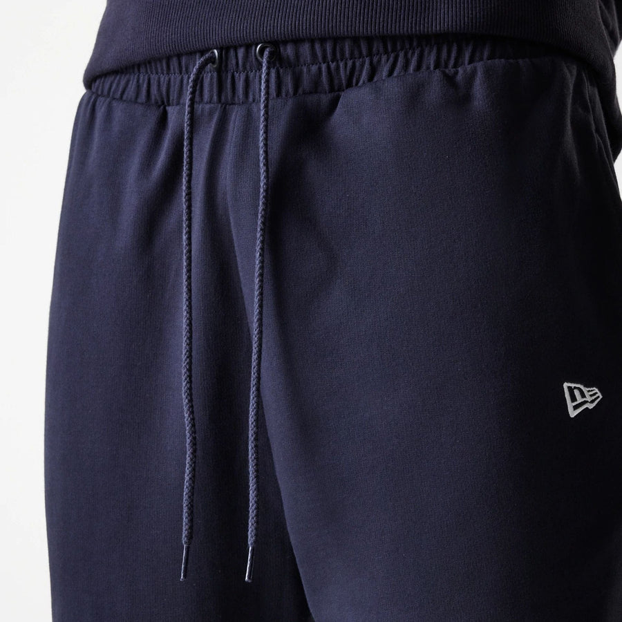 The Male model is wearing New York Yankees MLB League Essential Midi Navy Joggers 6