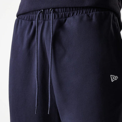 The Male model is wearing New York Yankees MLB League Essential Midi Navy Joggers 6