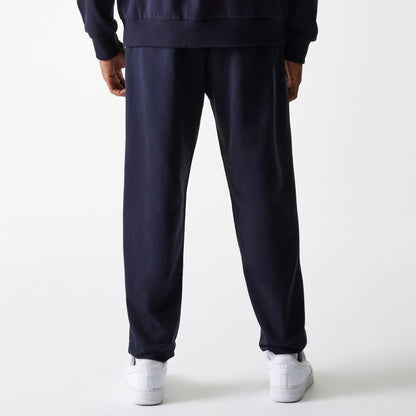 The Male model is wearing New York Yankees MLB League Essential Midi Navy Joggers 2