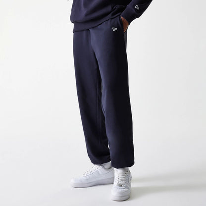 The Male model is wearing New York Yankees MLB League Essential Midi Navy Joggers 1