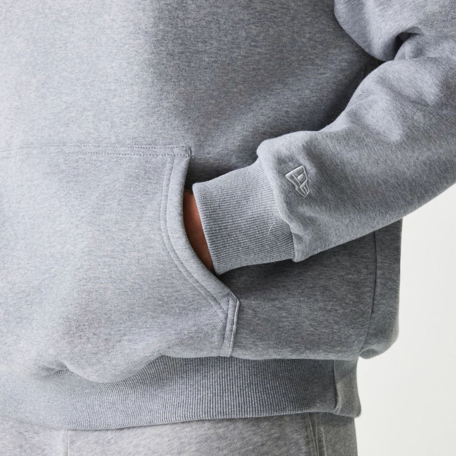 The Male model is wearing New York Yankees MLB League Essential Grey Oversized Pullover Hoodie 7