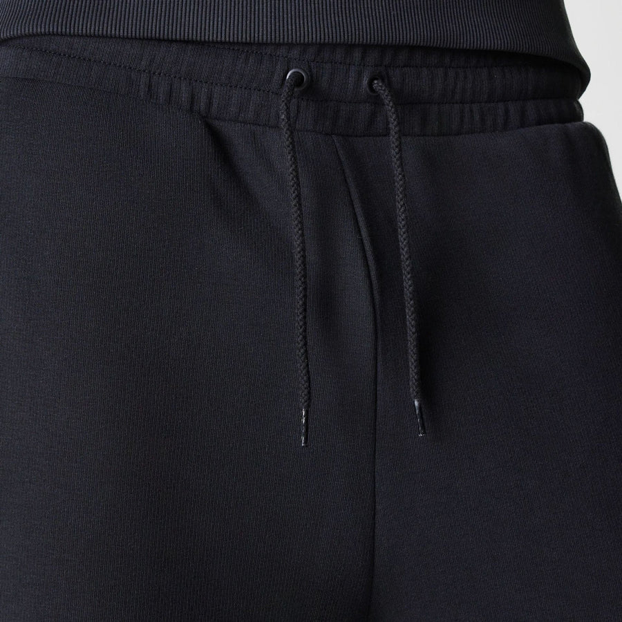 The Male model is wearing New York Yankees MLB League Essential Black Joggers 6