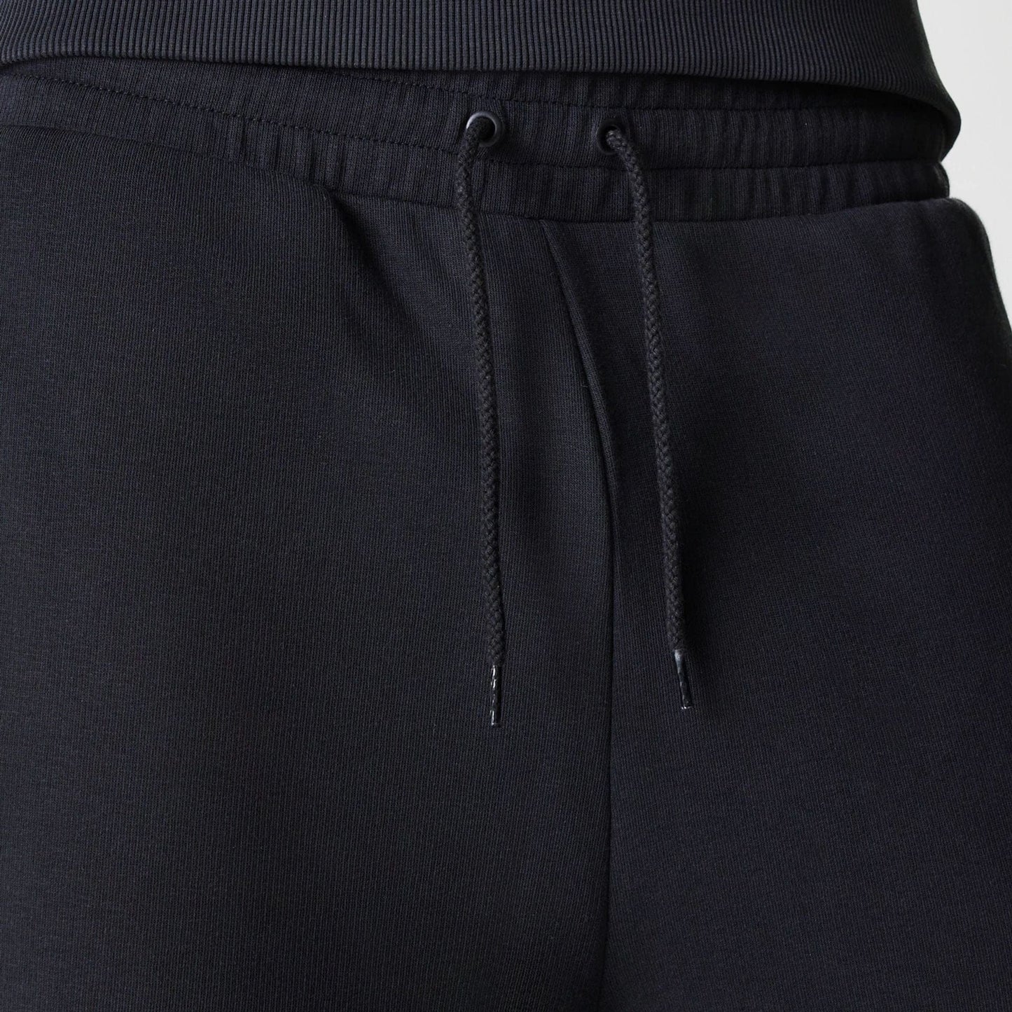 The Male model is wearing New York Yankees MLB League Essential Black Joggers 6