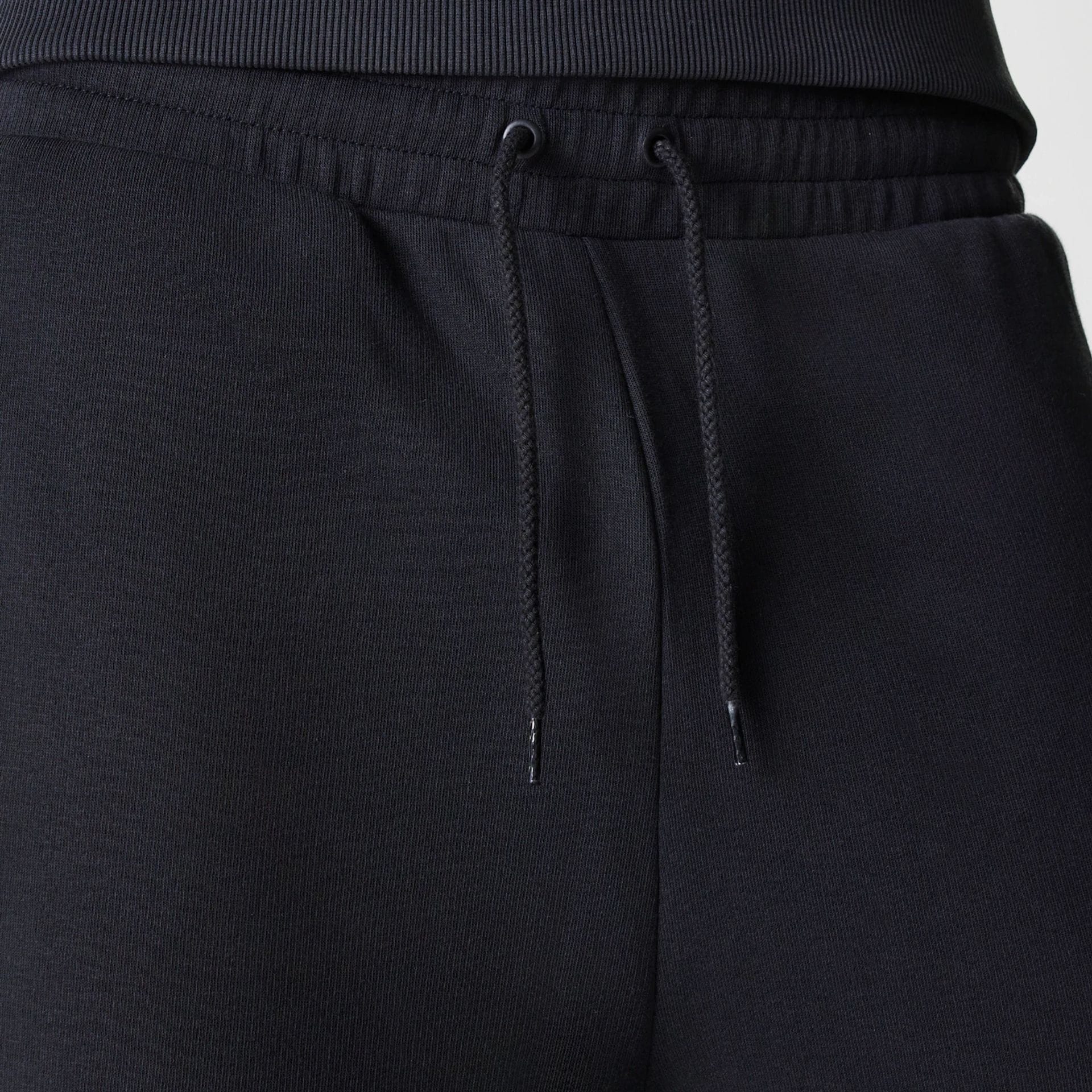 The Male model is wearing New York Yankees MLB League Essential Black Joggers 6