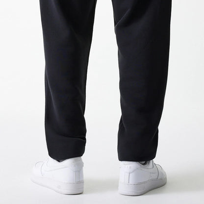 The Male model is wearing New York Yankees MLB League Essential Black Joggers 7