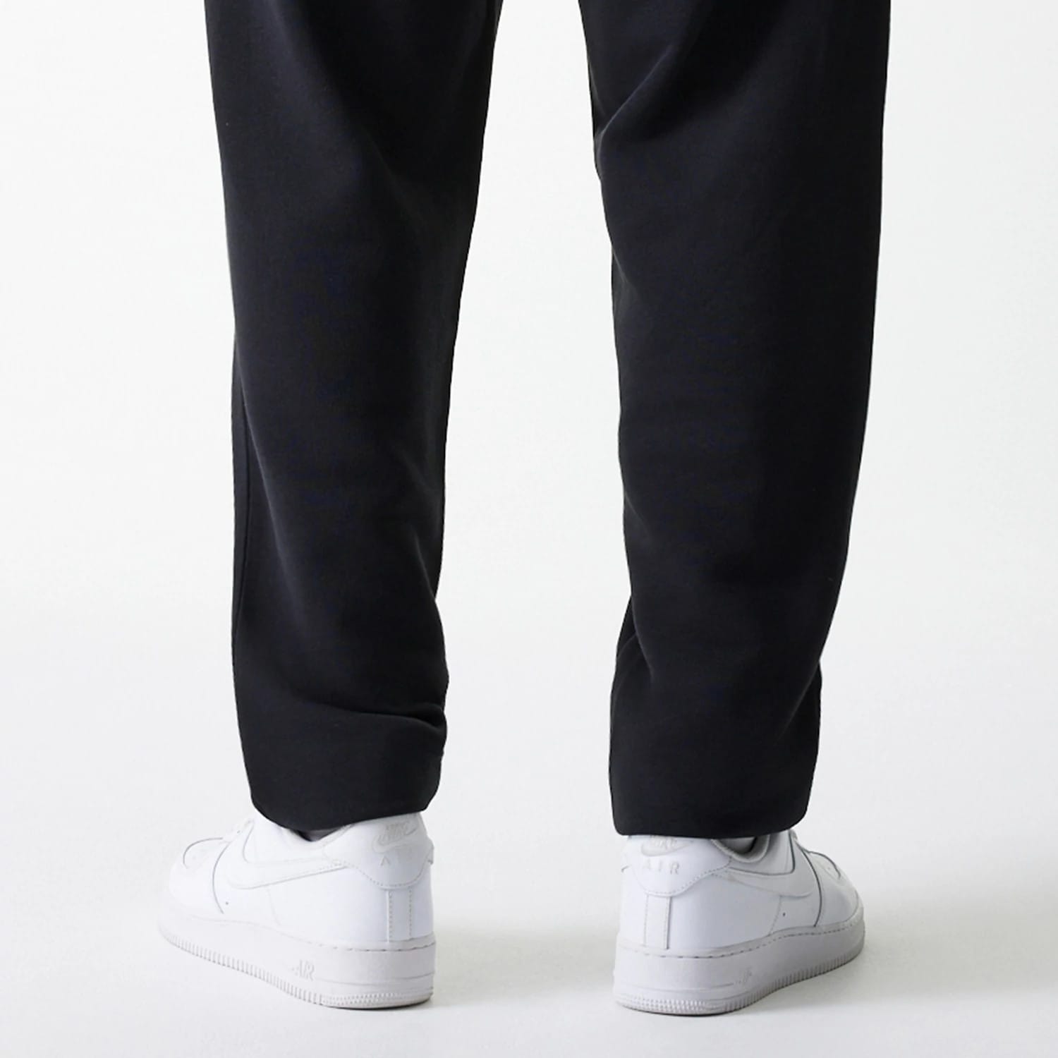 The Male model is wearing New York Yankees MLB League Essential Black Joggers 7