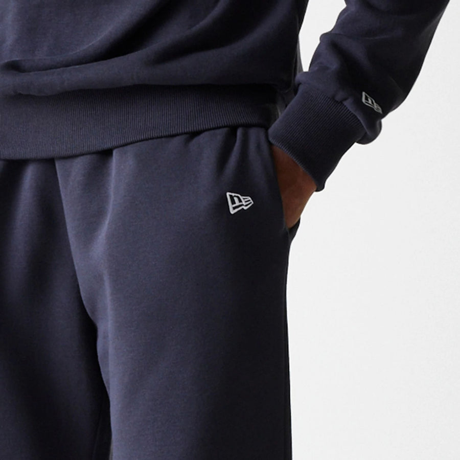 The Male model is wearing New York Yankees MLB League Essential Navy Joggers 5