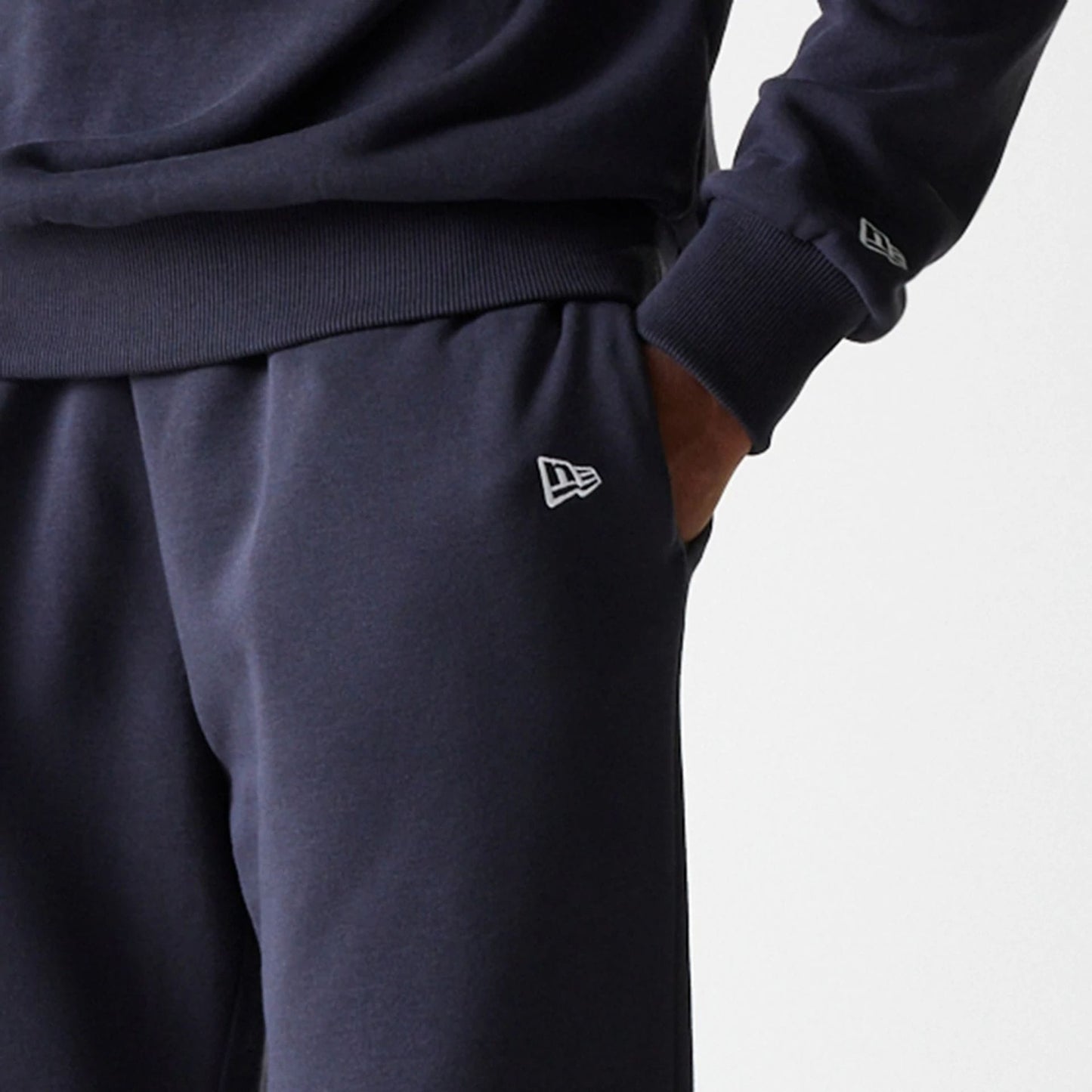 The Male model is wearing New York Yankees MLB League Essential Navy Joggers 5