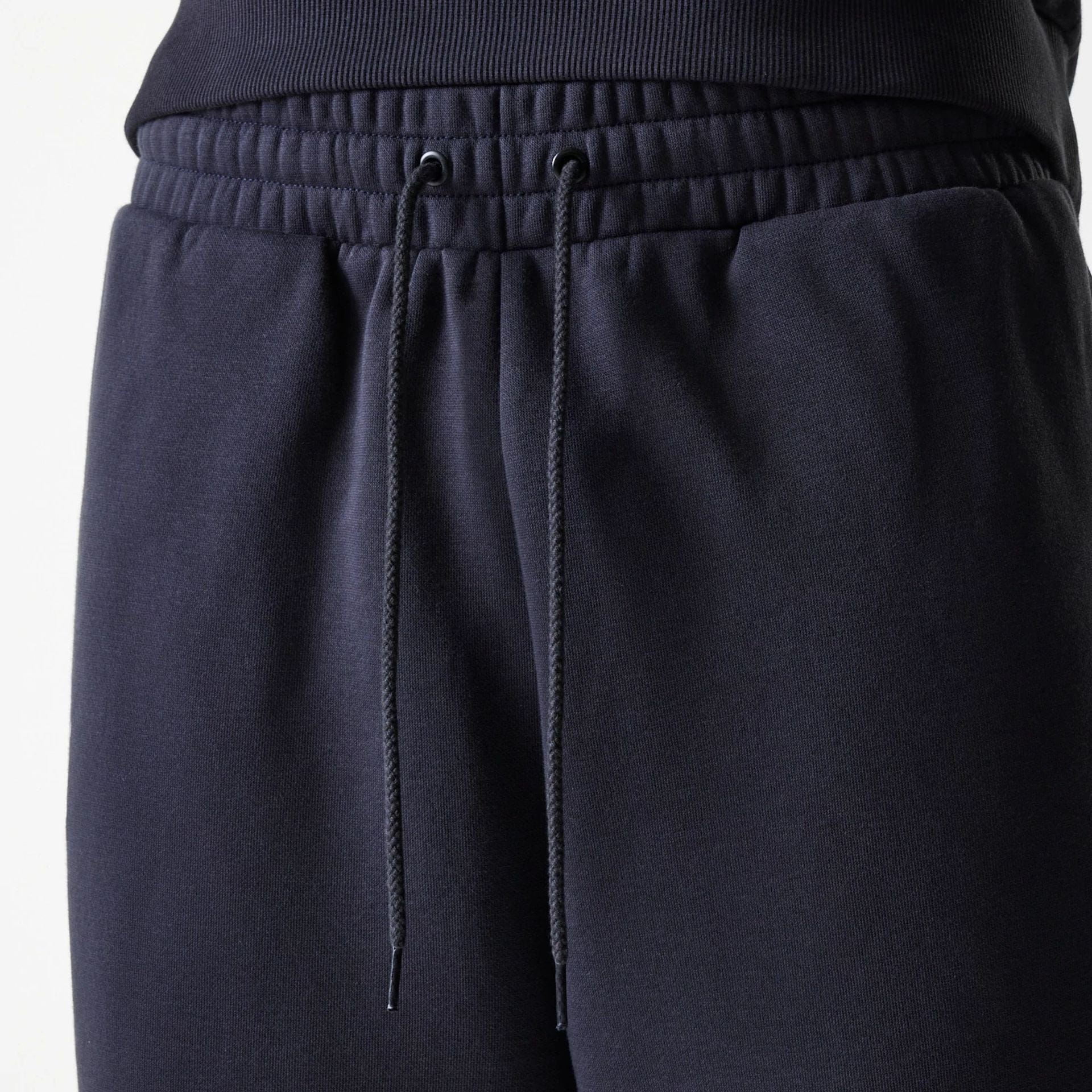 The Male model is wearing New York Yankees MLB League Essential Navy Joggers 6