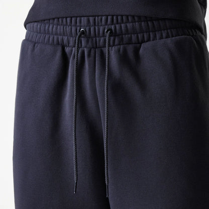 The Male model is wearing New York Yankees MLB League Essential Navy Joggers 6