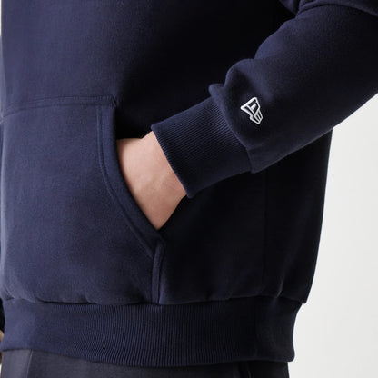The Male model is wearing New York Yankees MLB League Essential Navy Oversized Pullover Hoodie 7