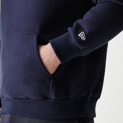 The Male model is wearing New York Yankees MLB League Essential Navy Oversized Pullover Hoodie 7