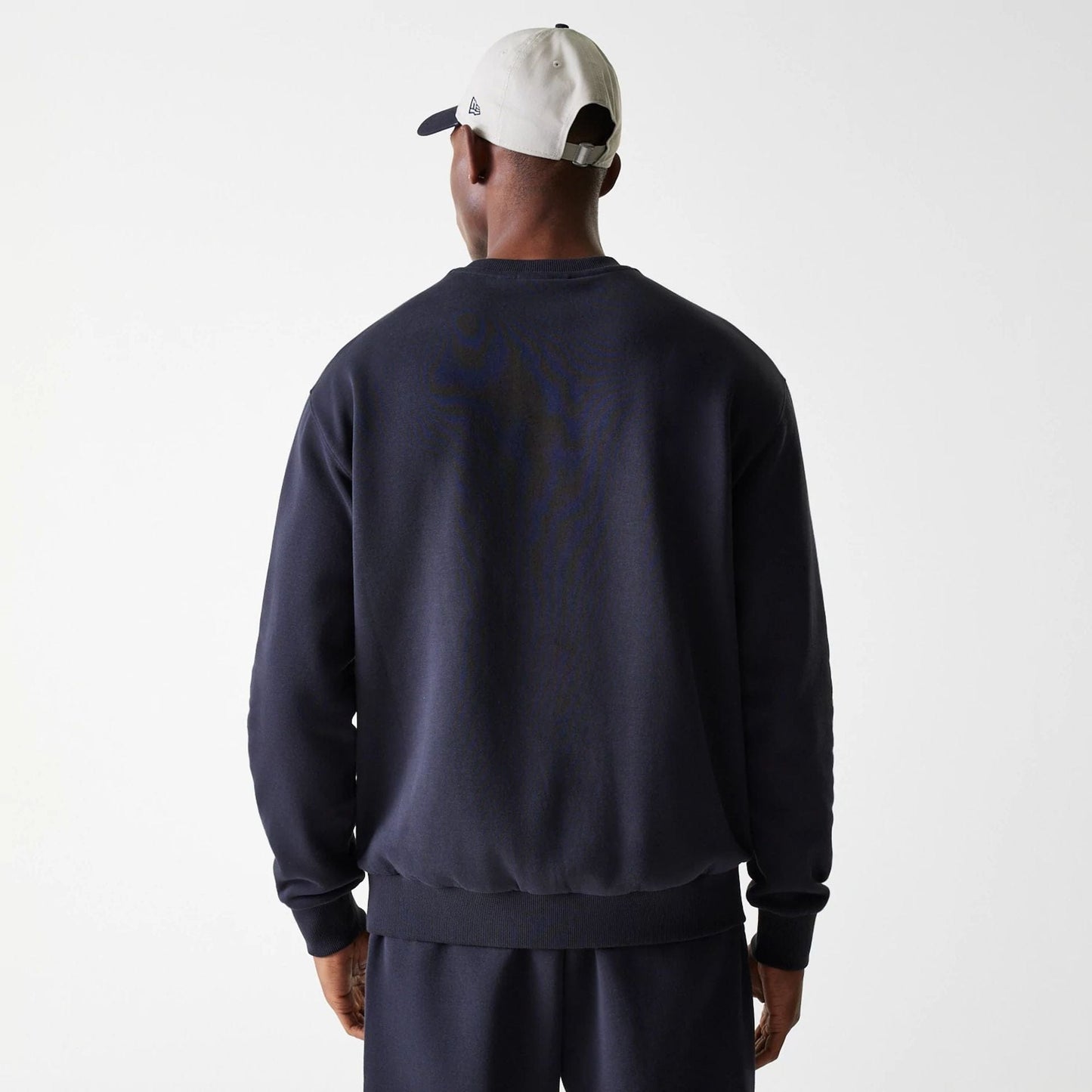The Male model is wearing New York Yankees MLB League Essential Midi Navy Oversized Crew Neck Sweater 2