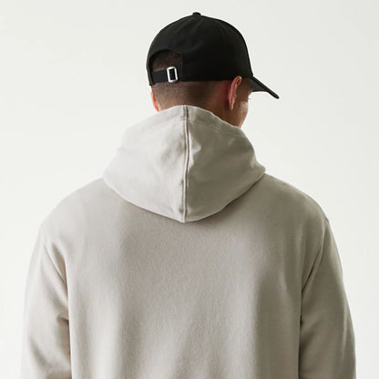 The Male model is wearing New York Yankees MLB League Essential Cream Oversized Pullover Hoodie 7